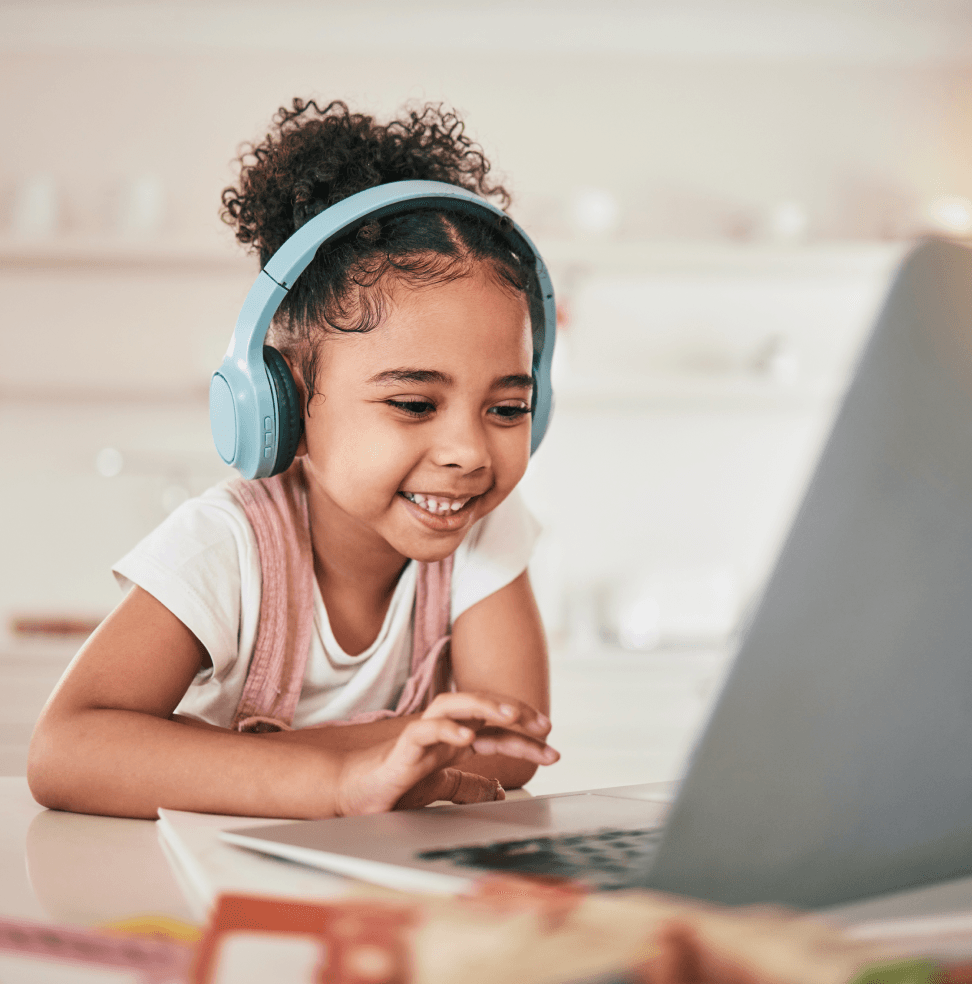 young girl headphones laptop 1